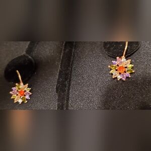 Dazzling Multi-color Crystal, Pierced Earrings, in Rose Color golden setting.